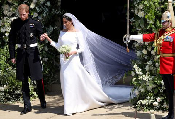Amal Clooney yellow  tie-back crepe dress on Meghan Markle royal wedding custom made by Stella McCartney