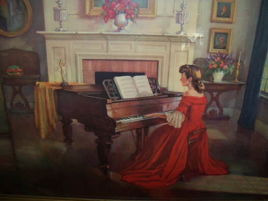red dress in painting a girl playing piano in red dress acredited to Antoni Ditlef
